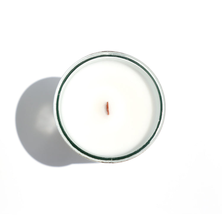 A Florida Keys inspired candle with wooden wick and Rum Runner scent notes in a 12oz vessel