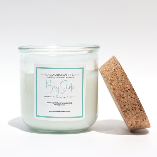 A Florida Keys inspired candle with wooden wick and Bayside scent notes