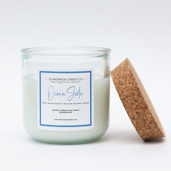 A Florida Keys inspired candle with wooden wick and Oceanside scent notes