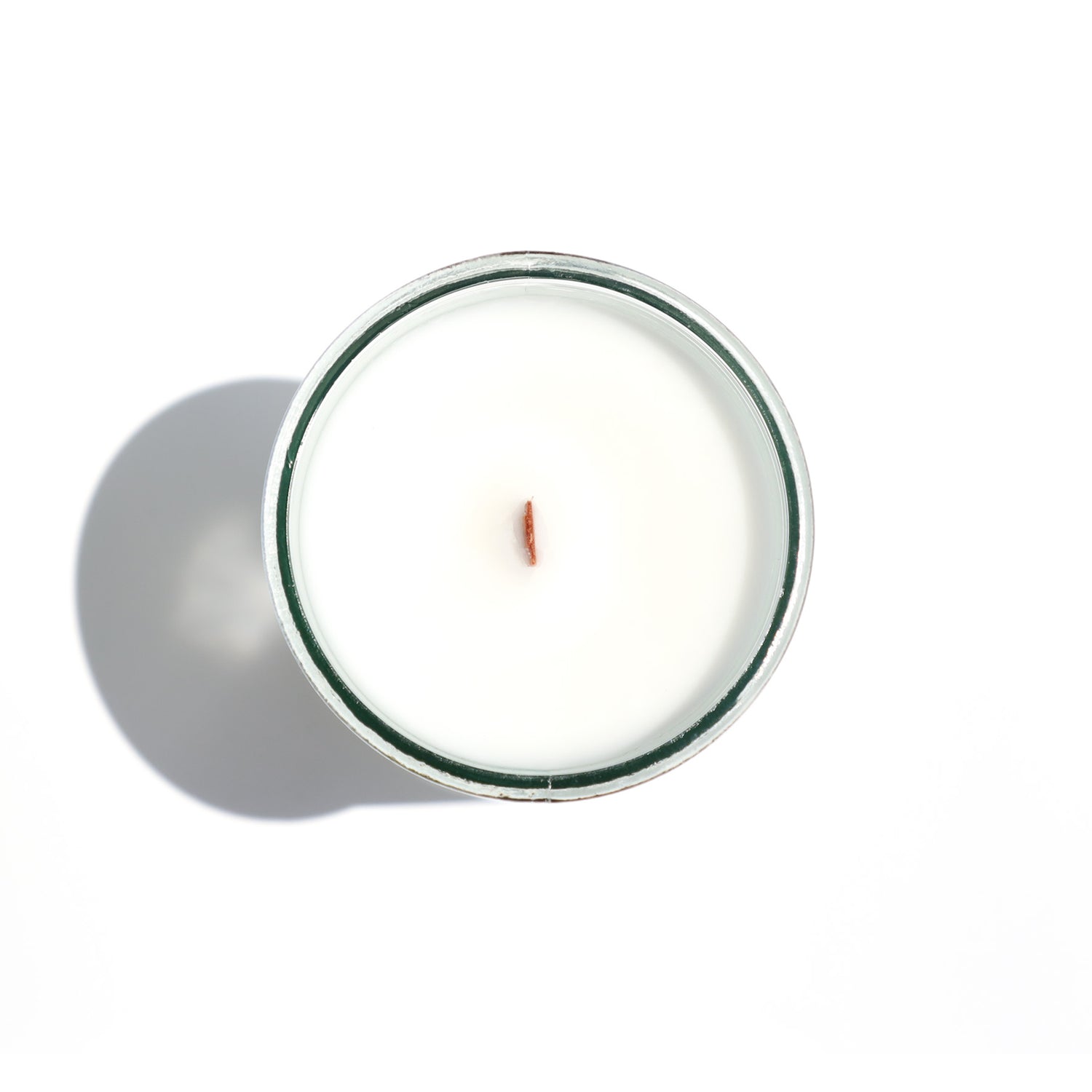 A Florida Keys inspired candle with wooden wick and Bay Side scent notes in a 12oz vessel