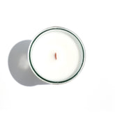 A Florida Keys inspired candle with wooden wick and Bay Side scent notes in a 12oz vessel