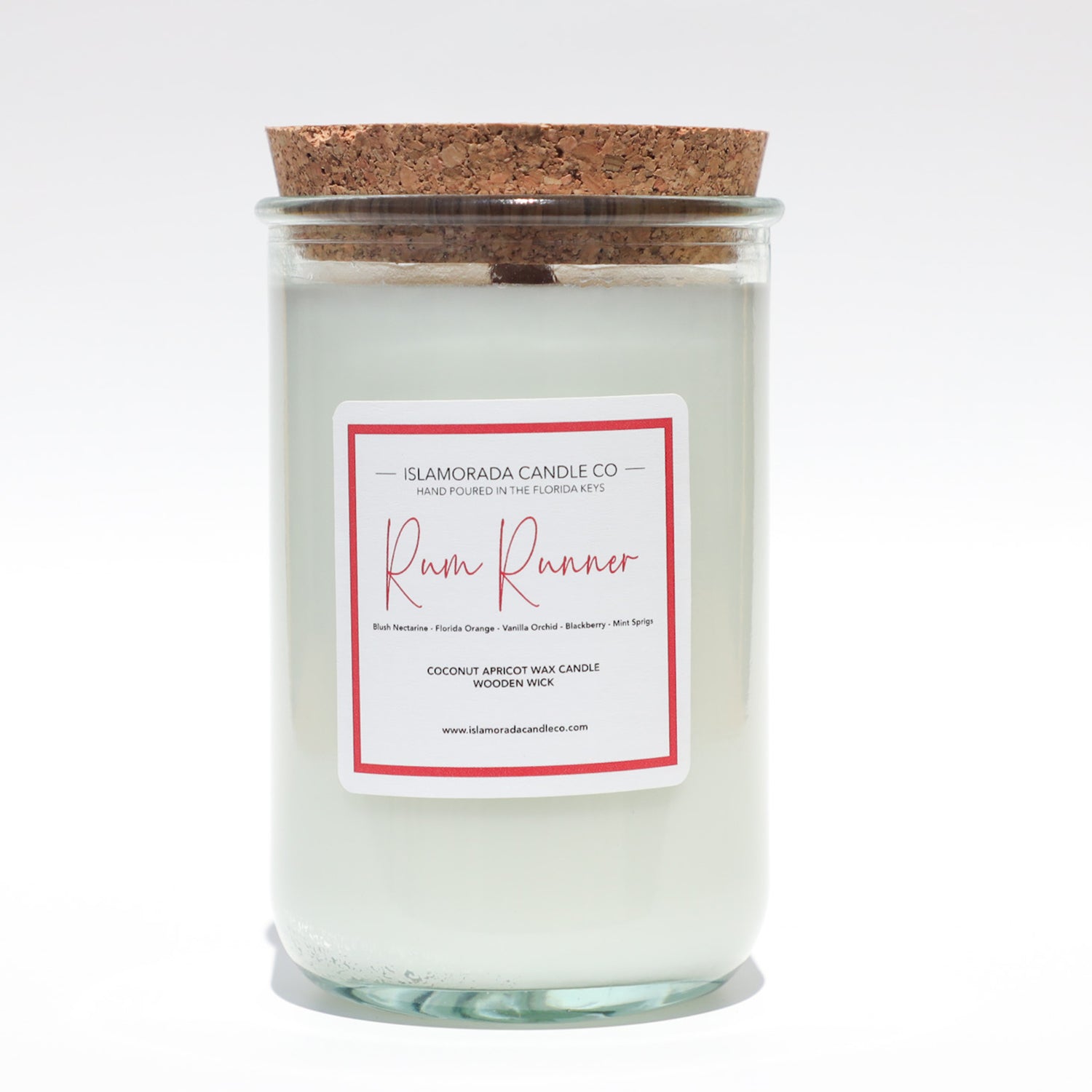 A Florida Keys inspired candle with wooden wick and Rum Runner scent notes in a 12oz vessel