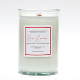 A Florida Keys inspired candle with wooden wick and Rum Runner scent notes in a 12oz vessel