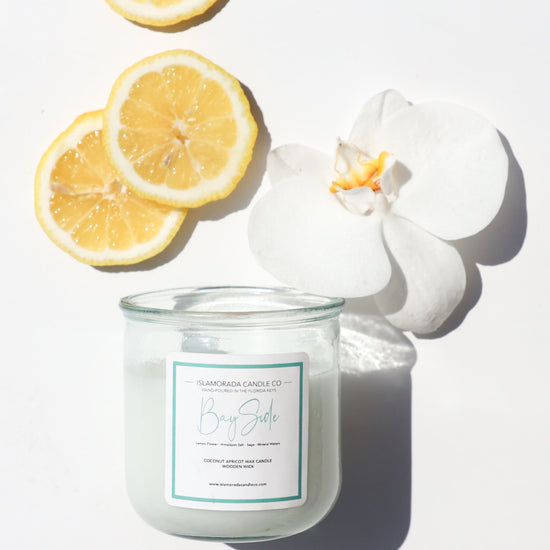 A Florida Keys inspired candle with wooden wick and Bayside scent notes