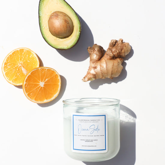 A Florida Keys inspired candle with wooden wick and Oceanside scent notes