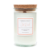 A Florida Keys inspired candle with wooden wick and Old Road scent notes in a 12oz vessel