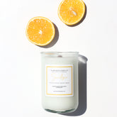 A Florida Keys inspired candle with wooden wick and Sandbar scent notes in a 12oz vessel
