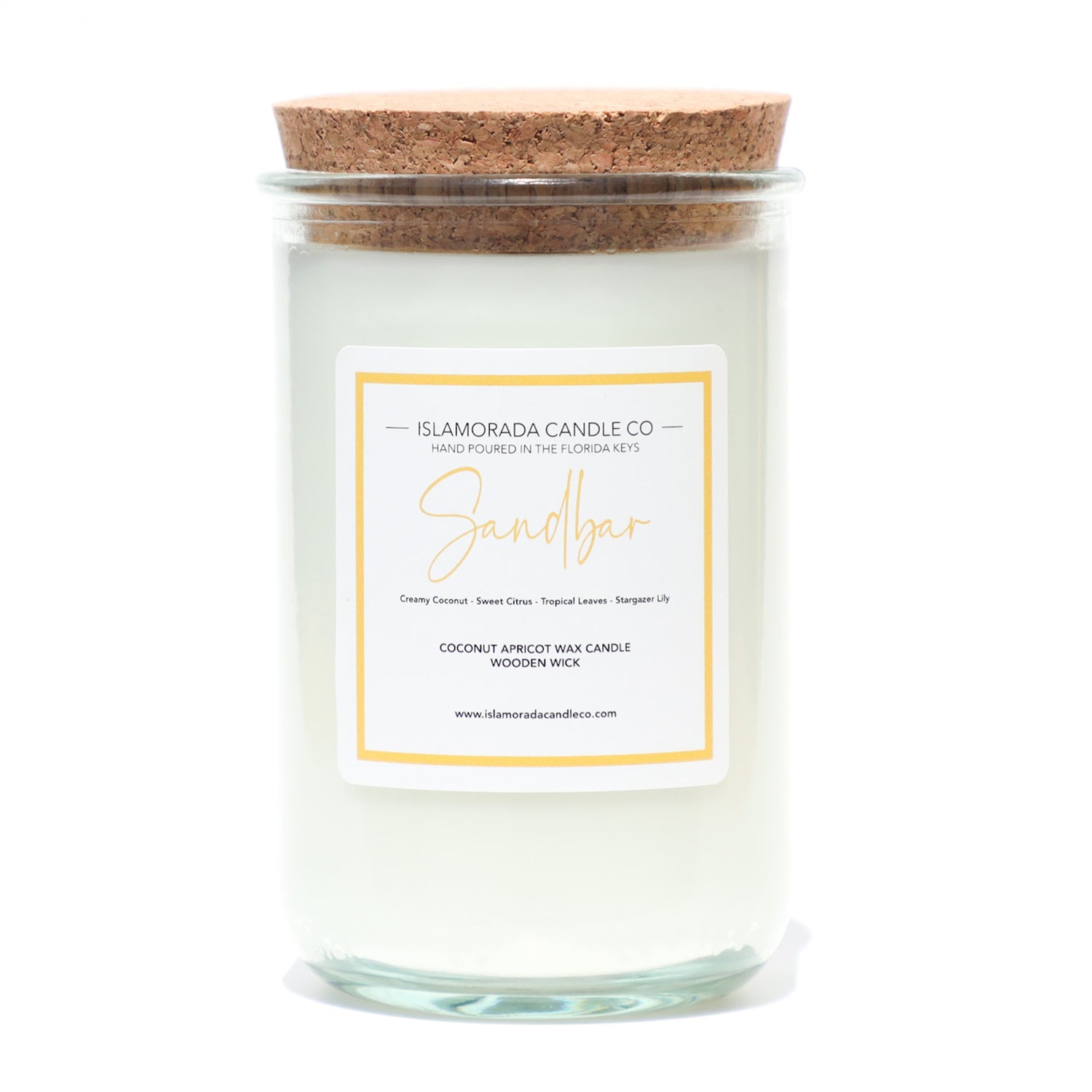 A Florida Keys inspired candle with wooden wick and Sandbar scent notes in a 12oz vessel