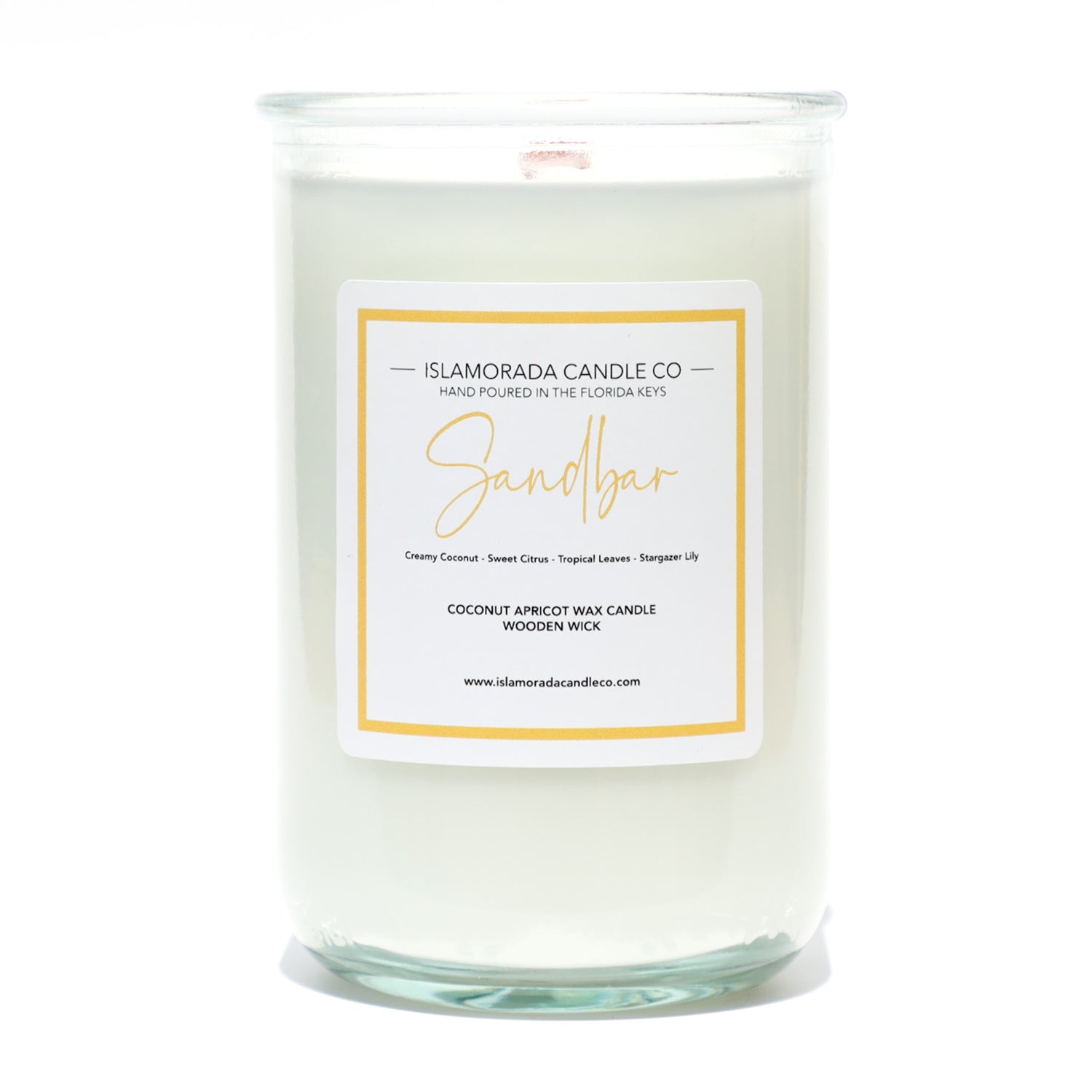 A Florida Keys inspired candle with wooden wick and Sandbar scent notes in a 12oz vessel