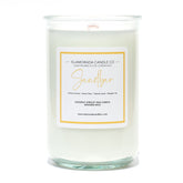 A Florida Keys inspired candle with wooden wick and Sandbar scent notes in a 12oz vessel