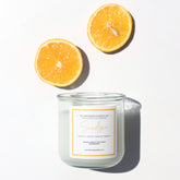 A Florida Keys inspired candle with wooden wick and Sandbar scent notes